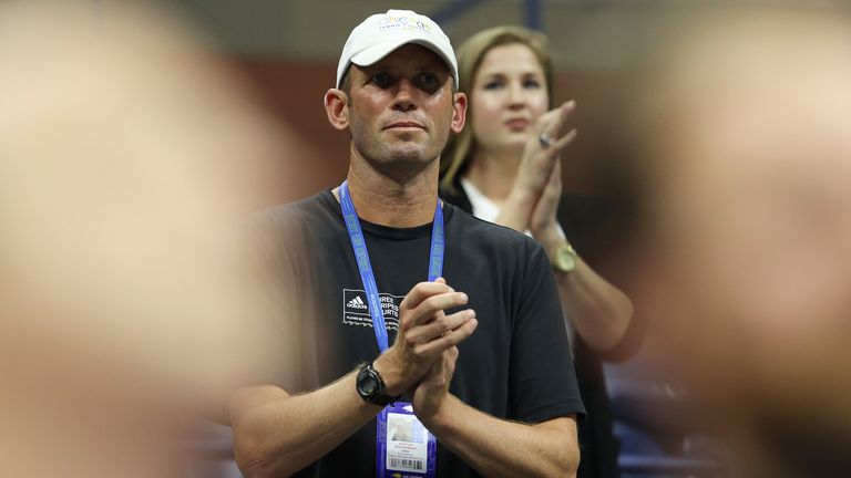 Andrew Richardson, coach of Emma Raducanu of Great Britain, cheers after Raducanu defeated Maria Sakkari of Greece during their Women’s Sing