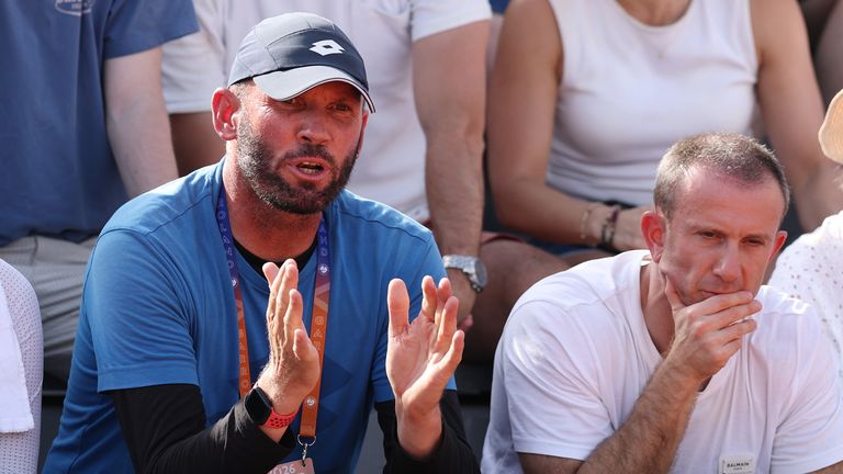 Andrew Richardson, Coach of Emma Raducanu of Great Britain, reacts during the Women's Singles first round match between Emma Raducanu of Gre