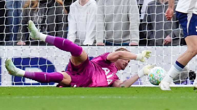 Tottenham Hotspur goalkeeper Antonin Kinsky saves from Leeds United's Joe Rodon's header