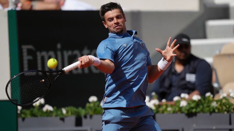 Arthur Gea of France returns to Karen Khachanov of Russia during the first round men's singles tennis match at the French Open tennis tourna