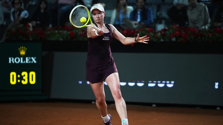 Barbora Krejcikova of Czechia, returns the ball to Aryna Sabalenka