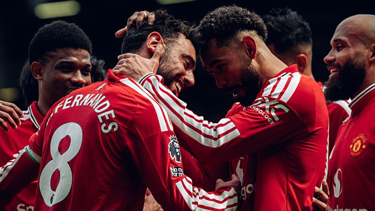 Bruno Fernandes is congratulated by his Man Utd team-mates