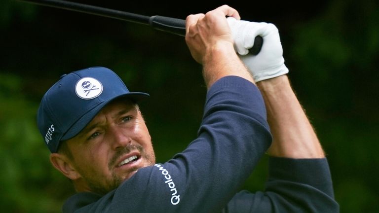 Bryson DeChambeau watches his tee shot on the fourth hole during the first round of the PGA Championship 
