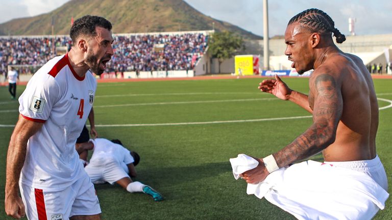 Roberto Lopes (left) and Garry Rodrigues celebrate qualifying for Cape Verde's first World Cup