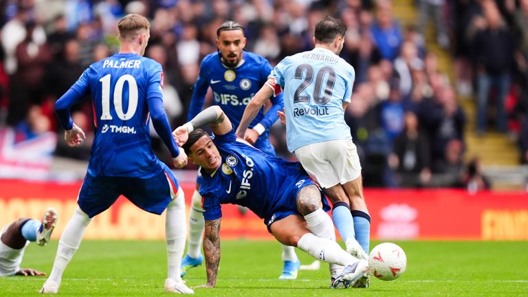 Enzo Fernandez was booked for this tackle on Bernardo Silva