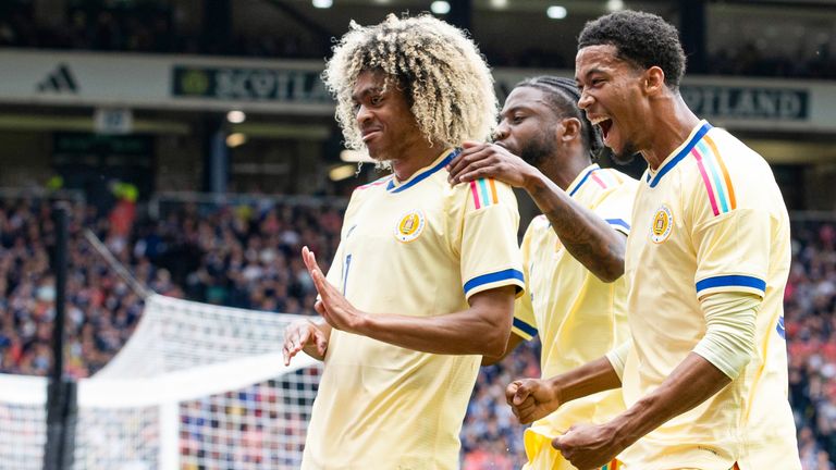 Curacao's Tahith Chong (L) celebrates scoring to make it 1-0 against Scotland
