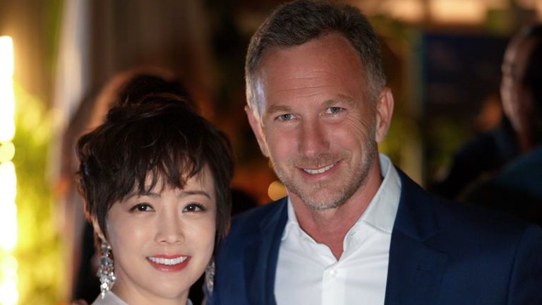 Christian Horner poses with BYD vice president Stella Li in Cannes