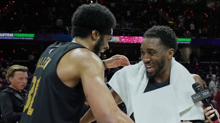 Cleveland Cavaliers center Jarrett Allen, left, and guard Donovan Mitchell, right, celebrate after the Cavaliers defeated the Toronto Raptor