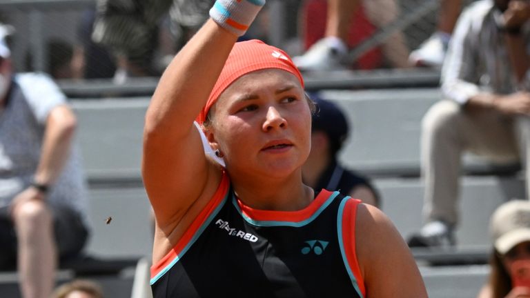 Diana Shnaider of Russia celebrates winning the third round women's singles tennis match against against Oleksandra Oliynykova of Ukraine at the French Open tennis tournament in Paris, Saturday, May 30, 2026. (AP Photo/Emma Da Silva)