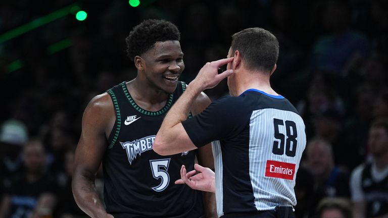 Anthony Edwards  talks with referee Josh Tiven during the first half of Game 6 