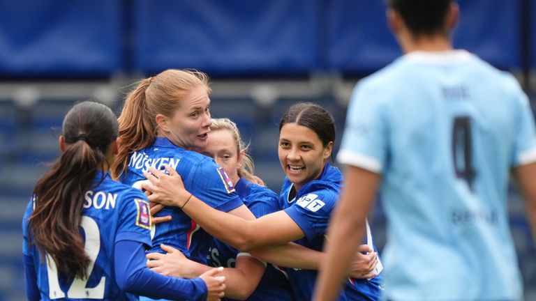 Erin Cuthbert celebrates with team-mates after scoring Chelsea's first goal of the game