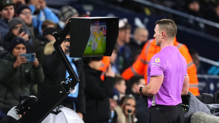 Referee checks VAR 