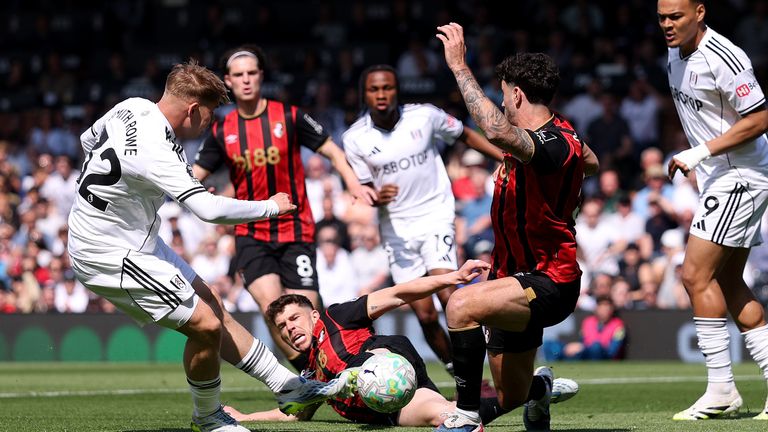 Emile Smith Rowe has a shot blocked by Ryan Christie