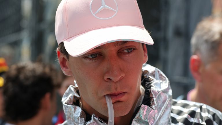 MIAMI GARDENS, FL - MAY 02: George Russell (63) of Great Britain and Mercedes-AMG PETRONAS Formula One Team drinks water on the grid before the Sprint Race of the Formula 1 Crypto.com Grand Prix on May 2, 2026, at Miami International Autodrome in Miami Gardens, Florida. (Photo by David Buono/Icon Sportswire) (Icon Sportswire via AP Images)