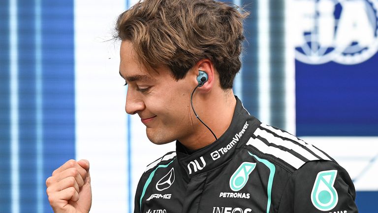 Mercedes driver George Russell, of Britain, celebrates after taking the pole position during qualifying at the F1 Canadian Grand Prix auto race in Montreal, Saturday, May 23, 2026. (Graham Hughes/The Canadian Press via AP)