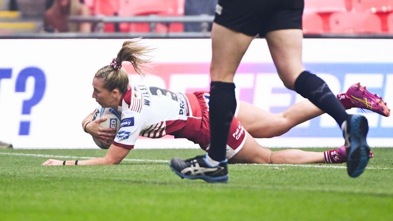  - Wigan's Georgia Wilson scores a try against St Helens.