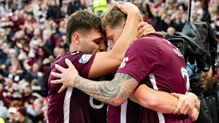 EDINBURGH, SCOTLAND - MAY 13: Hearts' Frankie Kent (R) celebrates scoring to make it 1-0 with teammate Claudio Braga during a William Hill Premiership match between Heart of Midlothian and Falkirk at Tynecastle Park, on May 13, 2026, in Edinburgh, Scotland. (Photo by Ross Parker / SNS Group)