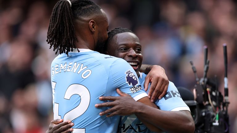 Jeremy Doku celebrates his goal with team-mate Antoine Semenyo