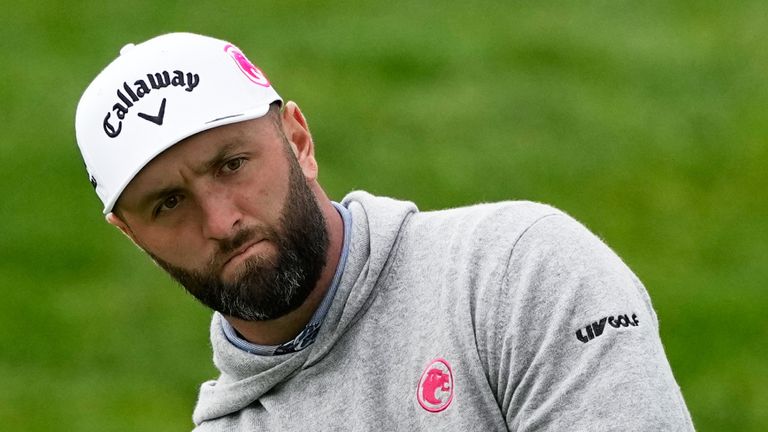 Jon Rahm, of Spain, chips to the green on the 11th hole during the first round of the PGA Championship golf tournament practice