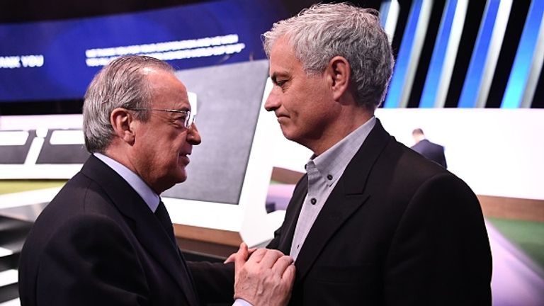 Real Madrid's president Florentino Perez (L) embraces Portuguese football manager Jose Mourinho at the 69th FIFA Congress at Paris Expo, Porte de Versailles in Paris on June 5, 2019. - Gianni Infantino was re-elected by acclamation for a second term 