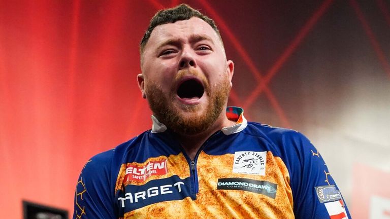 Josh Rock roars with delight after his victory at the Austrian Darts Open (Pic: Paul Targyik/PDC Europe)