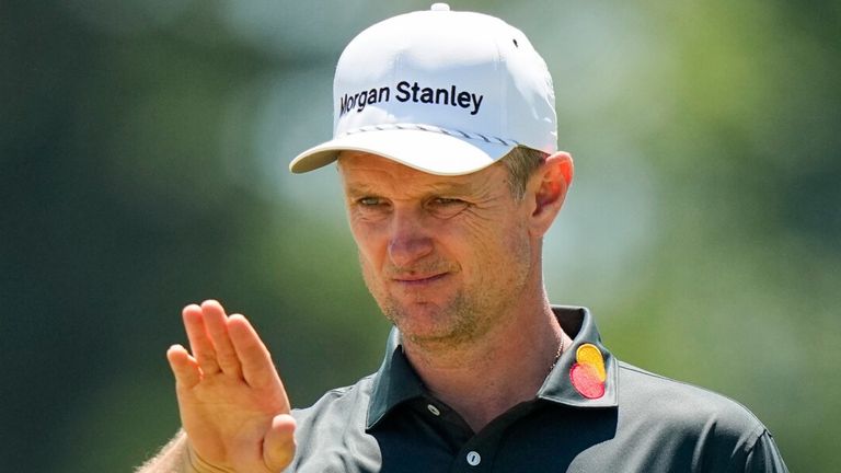 Justin Rose, of England, lines up his shot on the 16th green during the third round of the PGA Championship