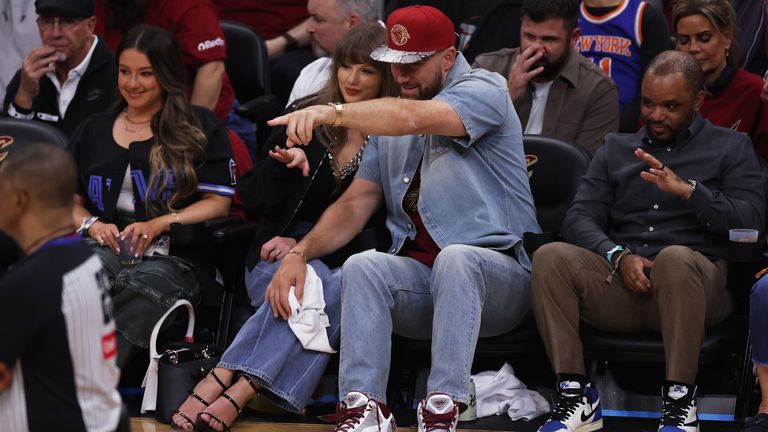 Taylor Swift and Travis Kelce watch the second half of Game 3 in the Eastern Conference Finals 