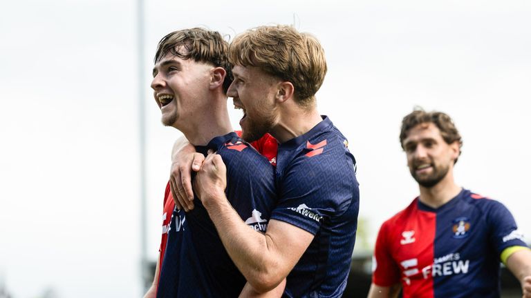 Kilmarnock's Findlay Curtis (L) celebrates scoring to make it 3-0 against St Mirren