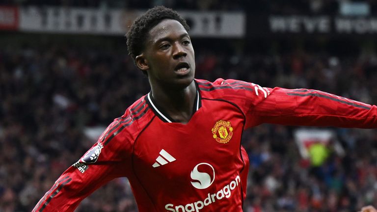 Kobbie Mainoo celebrates after giving Manchester United a 3-2 lead against Liverpool