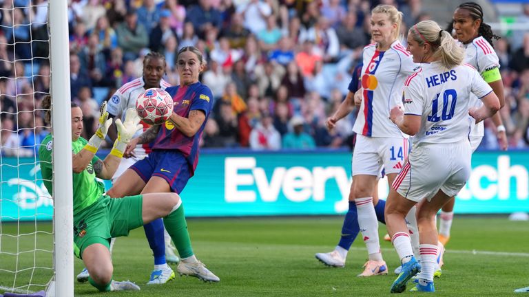 Lyon's Lindsey Heaps scores a goal that is ruled out for offside. (AP Photo/Kirsty Wigglesworth)