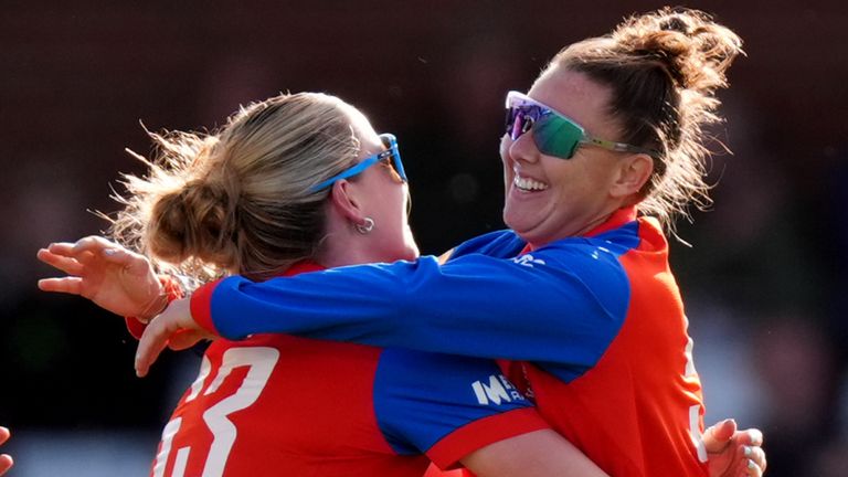 Lauren Bell (left) and Linsey Smith (right) celebrate a wicket in an England Women's T20 (PA Images)