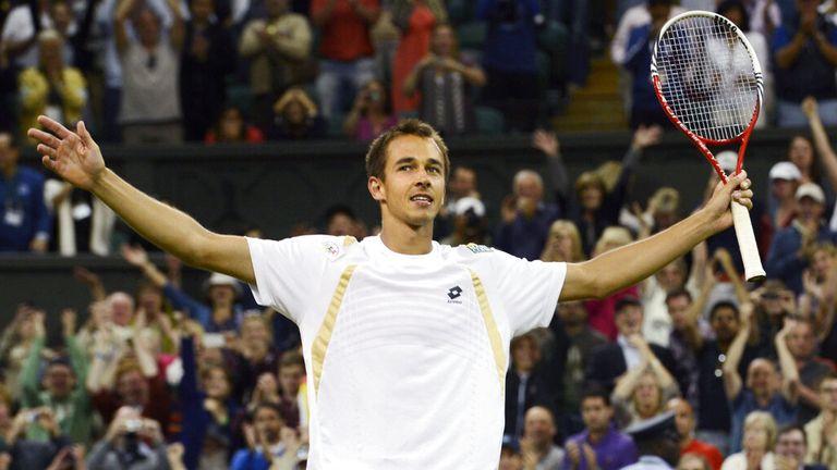 Lukas Rosol of the Czech Republic beats Rafael Nadal of Spain in a men's singles second-round match of the Wimbledon Championships at the Al