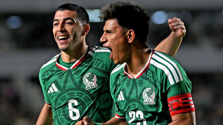 Mexico's midfielder #23 Jesus Gallardo celebrates scoring his team's third goal next to teammate midfielder #06 Erik Lira 