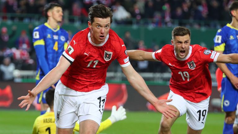 Michael Gregoritsch (left) celebrates scoring for Austria in qualifying