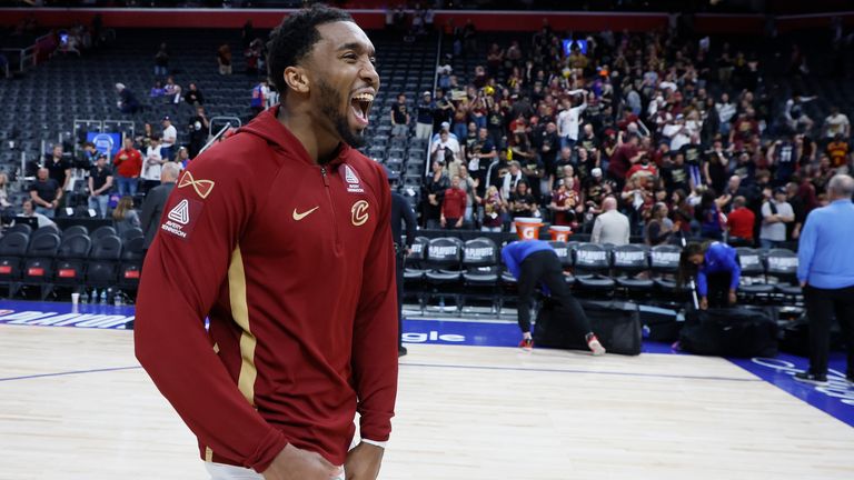 Cleveland Cavaliers guard Donovan Mitchell celebrates as he leaves the court 