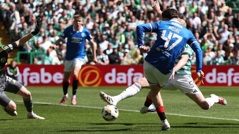 Rangers Mikey Moore scores to make it 1-0 during a William Hill Premiership match between Celtic and Rangers 