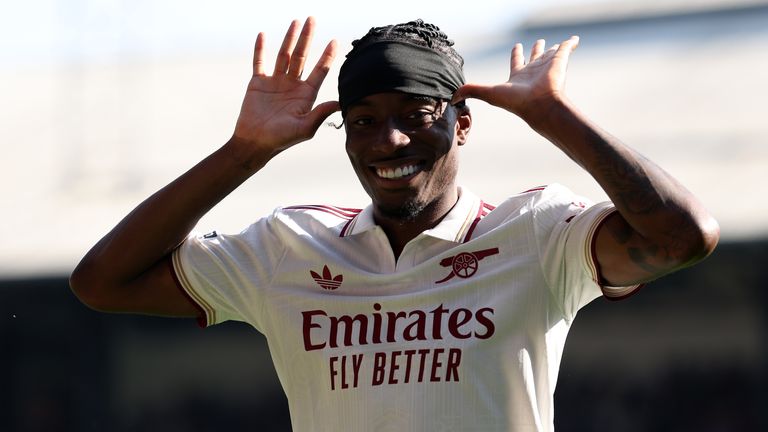 Noni Madueke celebrates making it 2-0 to Arsenal