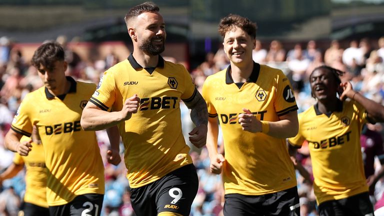 Adam Armstrong celebrates after converting a penalty to give Wolves an early lead against Burnley