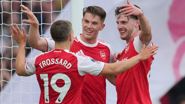 Viktor Gyokeres celebrates with Declan Rice and Leandro Trossard after giving Arsenal a 3-0 lead against Fulham
