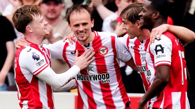 Mikkel Damsgaard is congratulated after scoring Brentford's third goal against West Ham