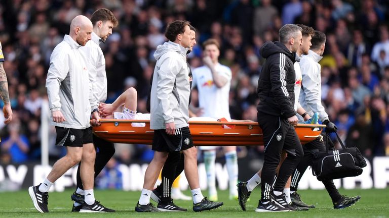 Anton Stach is stretchered off after suffering an injury against Brighton