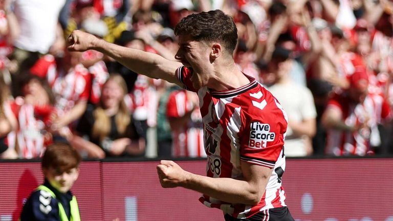 Trai Hume celebrates after giving Sunderland the lead against Chelsea