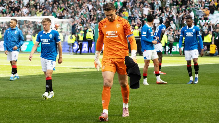 Goalkeeper Jack Butland walks off after Rangers lose to Celtic