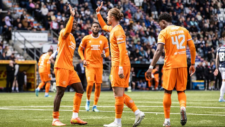 Rangers' Thelo Aasgaard (R) celebrates with Djeidi Gassama (L) 
