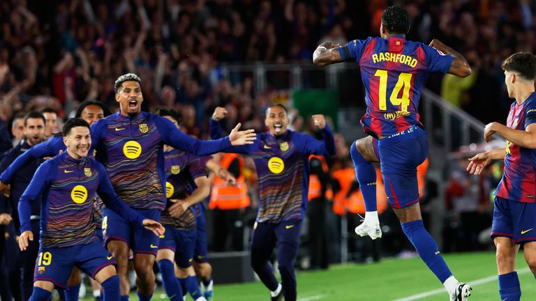 Barcelona's Marcus Rashford celebrates the opening goal during the Spanish La Liga soccer match between FC Barcelona and Real Madrid in Barcelona, Spain, Sunday, May 10, 2026. (AP Photo/Joan Monfort)