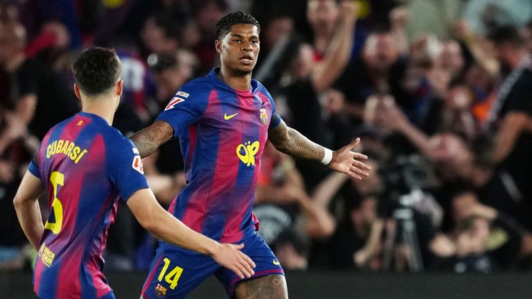 Barcelona's Marcus Rashford celebrates after scoring the opening goal during the Spanish La Liga soccer match between FC Barcelona and Real Madrid in Barcelona, Spain, Sunday, May 10, 2026. (AP Photo/Joan Mateu Parra)