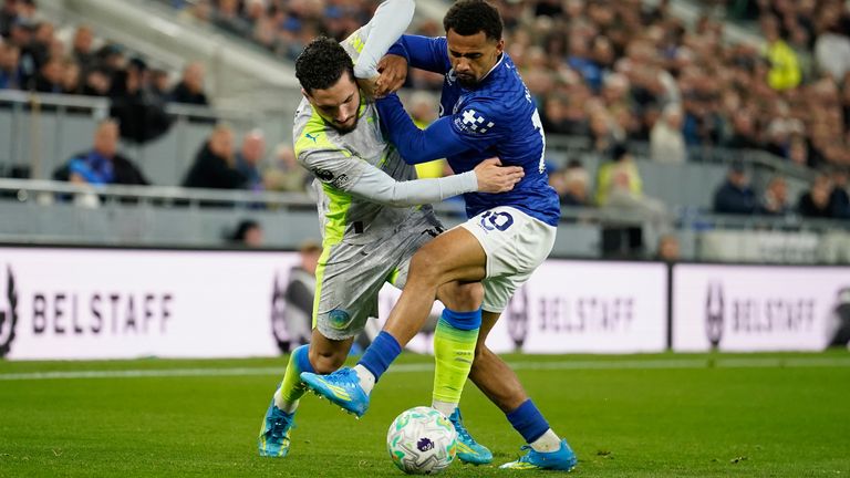 Manchester City's Rayan Cherki, left, and Everton's Iliman Ndiaye fight for the ball during the Premier League soccer match between Manchester City and Everton in Liverpool, England, Monday, May 4, 2026. (AP Photo/Dave Thompson)