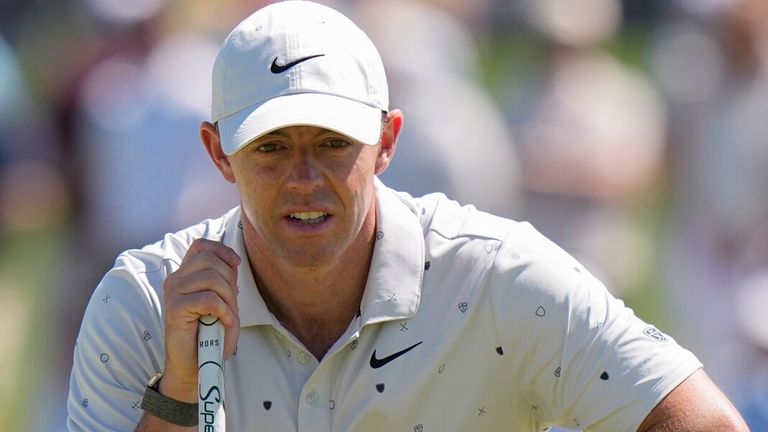 Rory McIlroy, of Northern Ireland, lines up his shot on the 16th green during the third round of the PGA Championship 