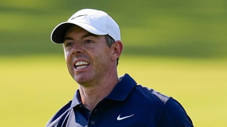 Rory McIlroy, of Northern Ireland, watches his shot on the 11th fairway during the final round of the PGA Championship