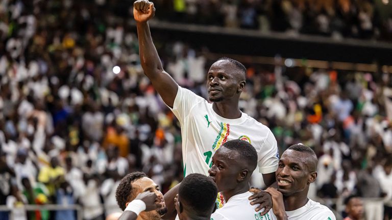 Sadio Mane (C) celebrates with teammates after scoring a goal during the FIFA World Cup 2026 Africa qualifiers 